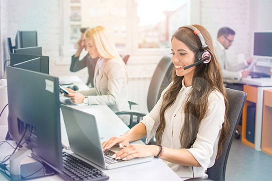 Flexible Talent Solutions, woman speaking at her headphones